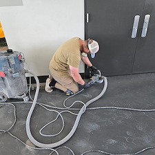 Worn-Out-Damaged-Epoxy-Concrete-Coating-Replaced-with-Long-Lasting-Polyaspartic-Coating-in-Louisville-Recreation-Building 1